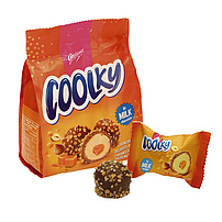 "Coolky Milk" Gaufrettes avec crème au goût de biscuit (48%) et noyau de caramel (8,7%) dans du chocolat au lait (25%) et pépites sucre-noisettes (10%).