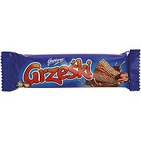 "Grzeski" Waffel mit Kakaogeschmack-Creme (48%) in Schokolade. Schokolade enthält neben Kakaobutter auch andere pflanzliche Fette.
