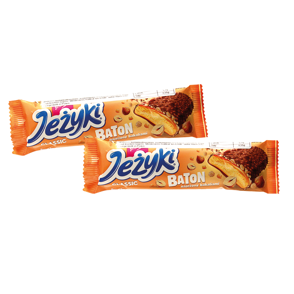 Keks "Jezyki Baton Classic" mit 32% Karamellauflage, mit Haselnüssen und Getreidecrisps in Milchschokolade. Schokolade enthält neben Kakaobutter auch andere pflanzliche Fette