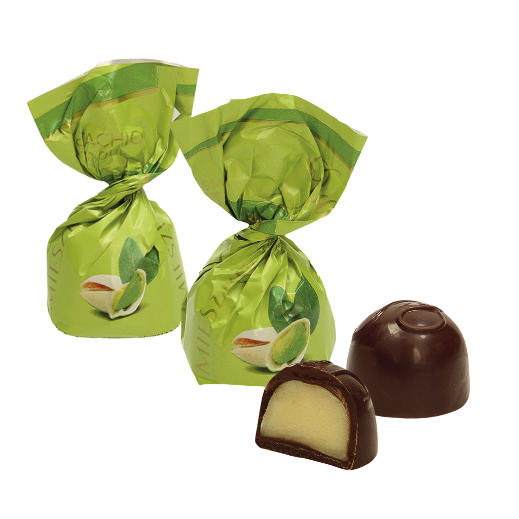 "Pistachio" Pralines fourrées de crème au goût de pistache. Le chocolat contient matières grasses végétales en plus du beurre de cacao.